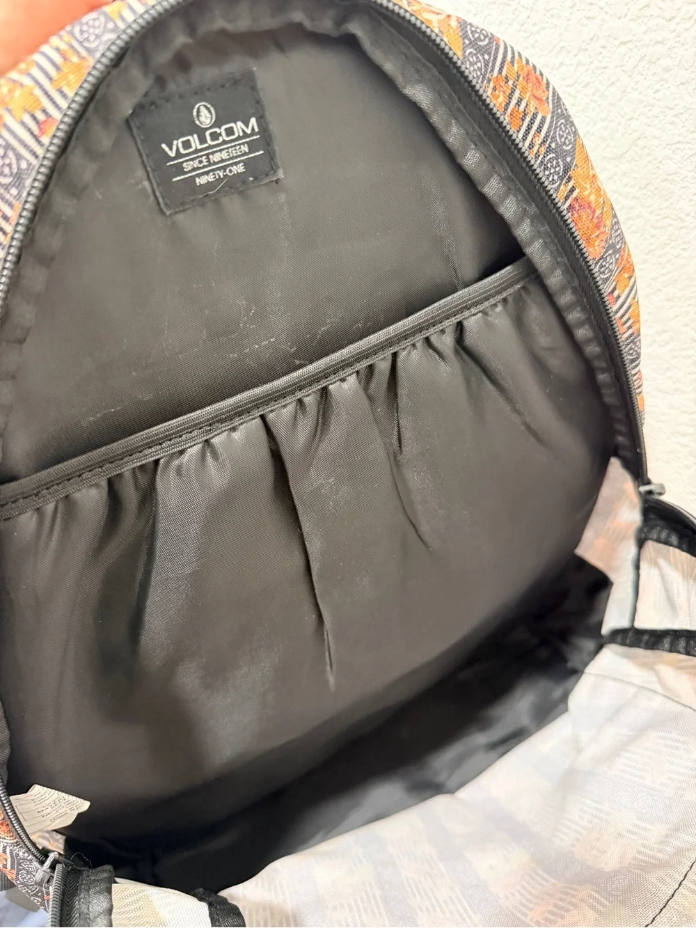Volcom Black Floral Stripe Backpack with Orange Flowered Accents